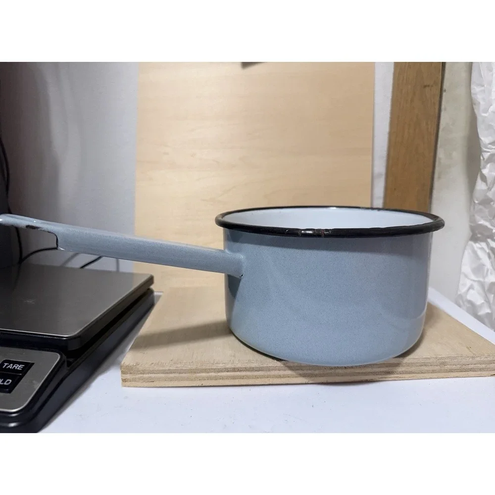 vintage light blue enamelware saucepan